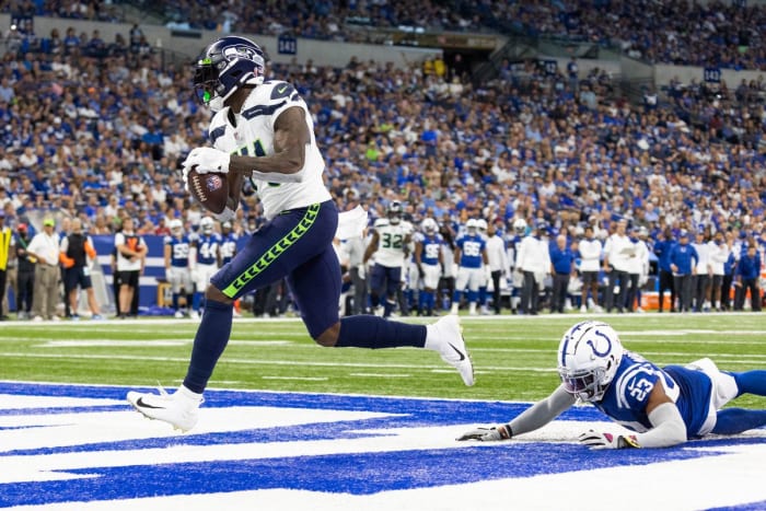 Seattle Seahawks receiver DK Metcalf reels in a deep ball from quarterback Geno Smith to find the endzone vs. the Indianapolis Colts (2021).